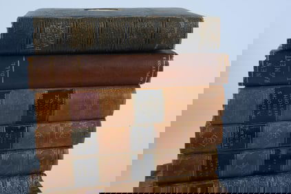 8 HARDCOVER AND LEATHER BOOKS ON POETRY AND OTHER WORKS