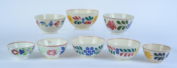 EIGHT SPATTERWARE BOWLS.