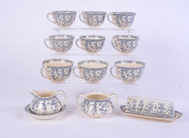 GROUP OF ENGLISH TEA CUPS WITH BLUE FOLIAGE DESIGN
