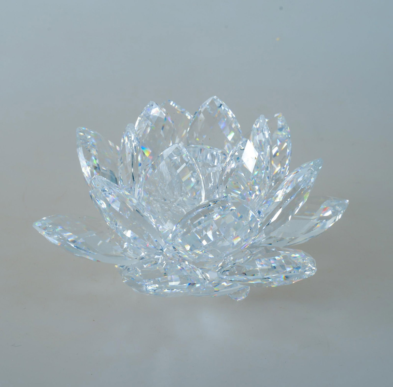 SWAROVSKI CRYSTAL FLOWER CANDLE HOLDER: In original box, height 3 inches