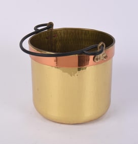 BRASS POT WITH HANDLE AND COPPER BAND.