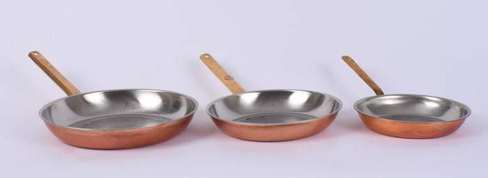 SET OF THREE CULINOX PANS.