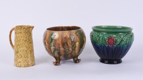 TWO JARDINIERES AND A YELLOW WARE PITCHER.