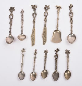 TWELVE ITALIAN DEMITASSE SPOONS AND KNIVES.