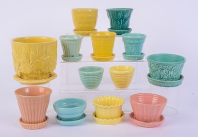 2 MCCOY PLANTERS WITH GROUP OF OTHER COLORFUL CERAMIC PLANTERS