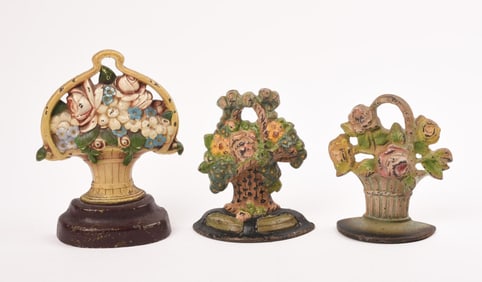 3 CAST IRON FLORAL PAINTED DOORSTOPS