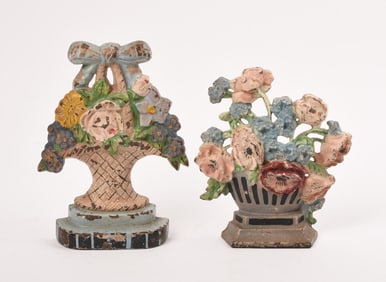 2 CAST IRON PAINTED BASKET OF FLOWERS DOORSTOPS