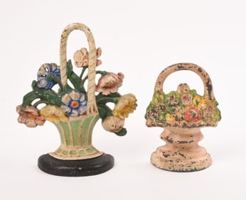 2 CAST IRON PAINTED BASKET OF FLOWERS DOORSTOPS