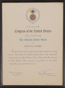 HARRY TRUMAN SIGNED SELECTIVE SERVICE MEDAL CERTIFICATE.