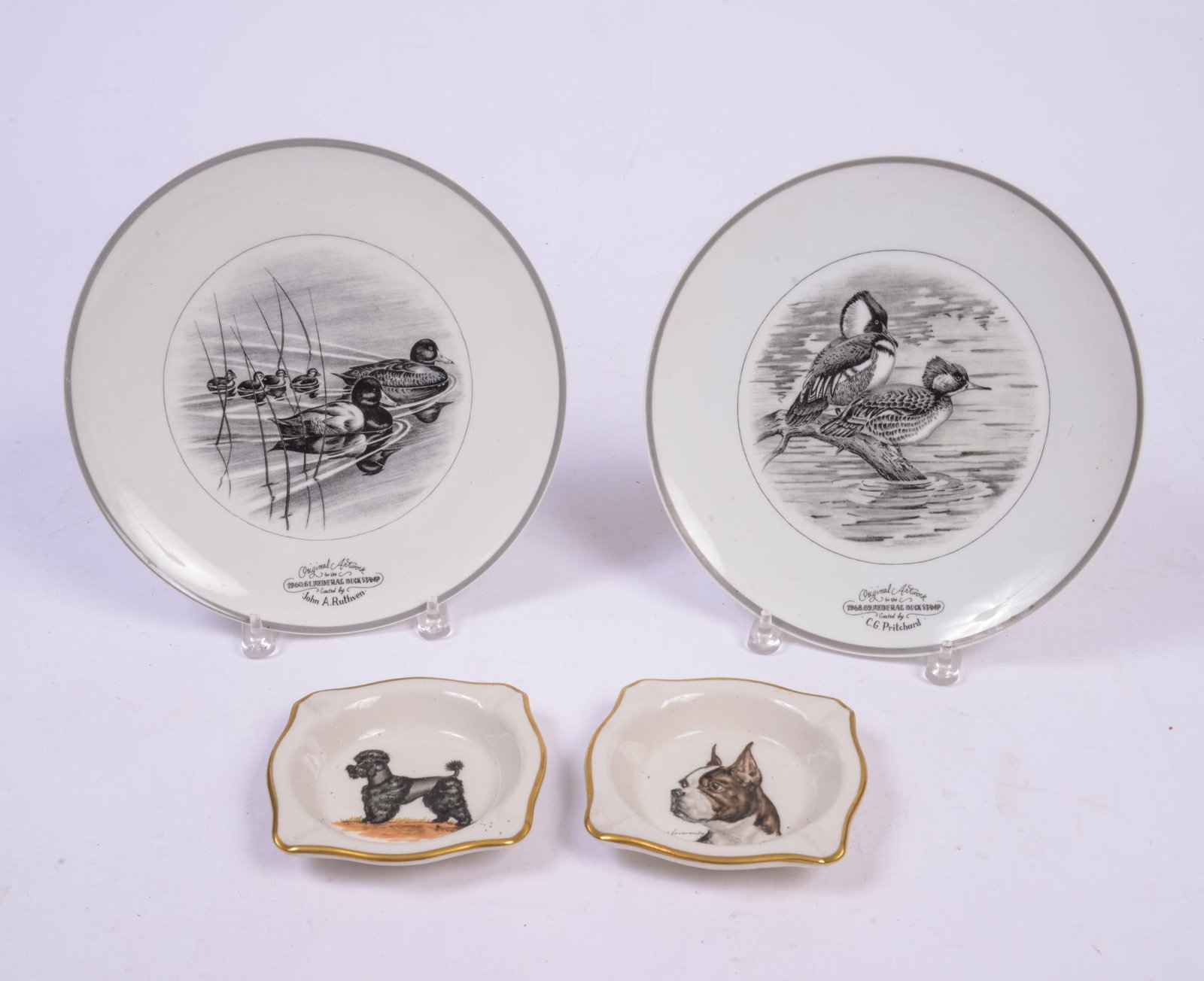 Pair of Limoges Duck Plates by C.G.Pritchard: With 2 Abercrombie & Fitch ashtrays, plate diameter 11.5 inches