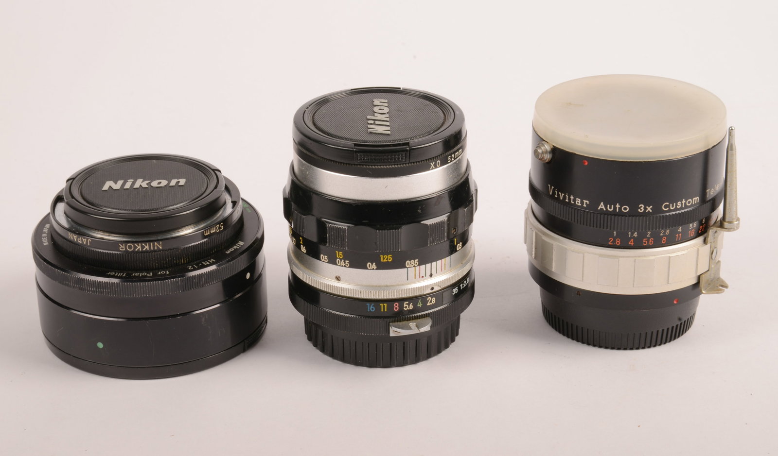 Nikkor-S 35 mm f2.8 and Vivitar teleconverter.: Lens in good condition, with front and rear caps.
