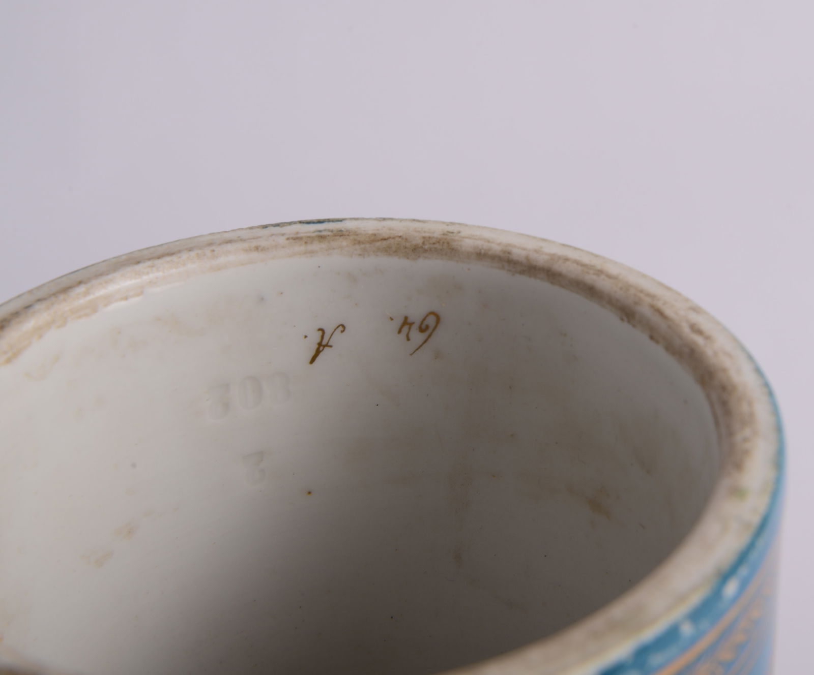 French Napoleonic Covered Urn on Metal Base: With blue and gold decoration and portrait of Napoleon, height 17.25 inches, minor loss to paint.