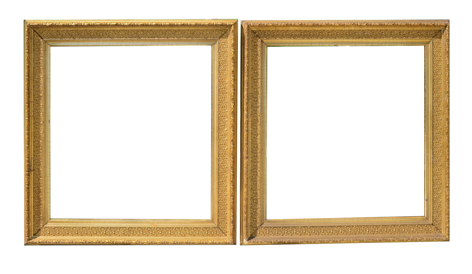 Pair of Antique Frames: Rabbet 19.5 x 18 inches, overall 25 x 23.5 inches. Some losses.