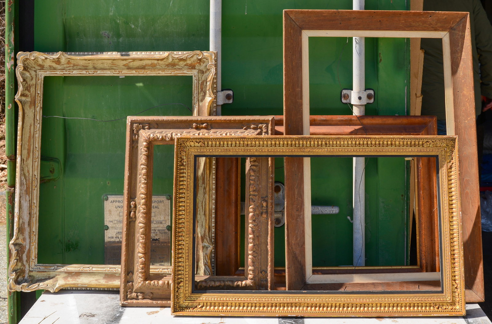 Five Antique Frames: Rabbets 14 x 20, 18 x 22, 11 x 14, 16 x 26, and 14 x 26 inches. Some losses.