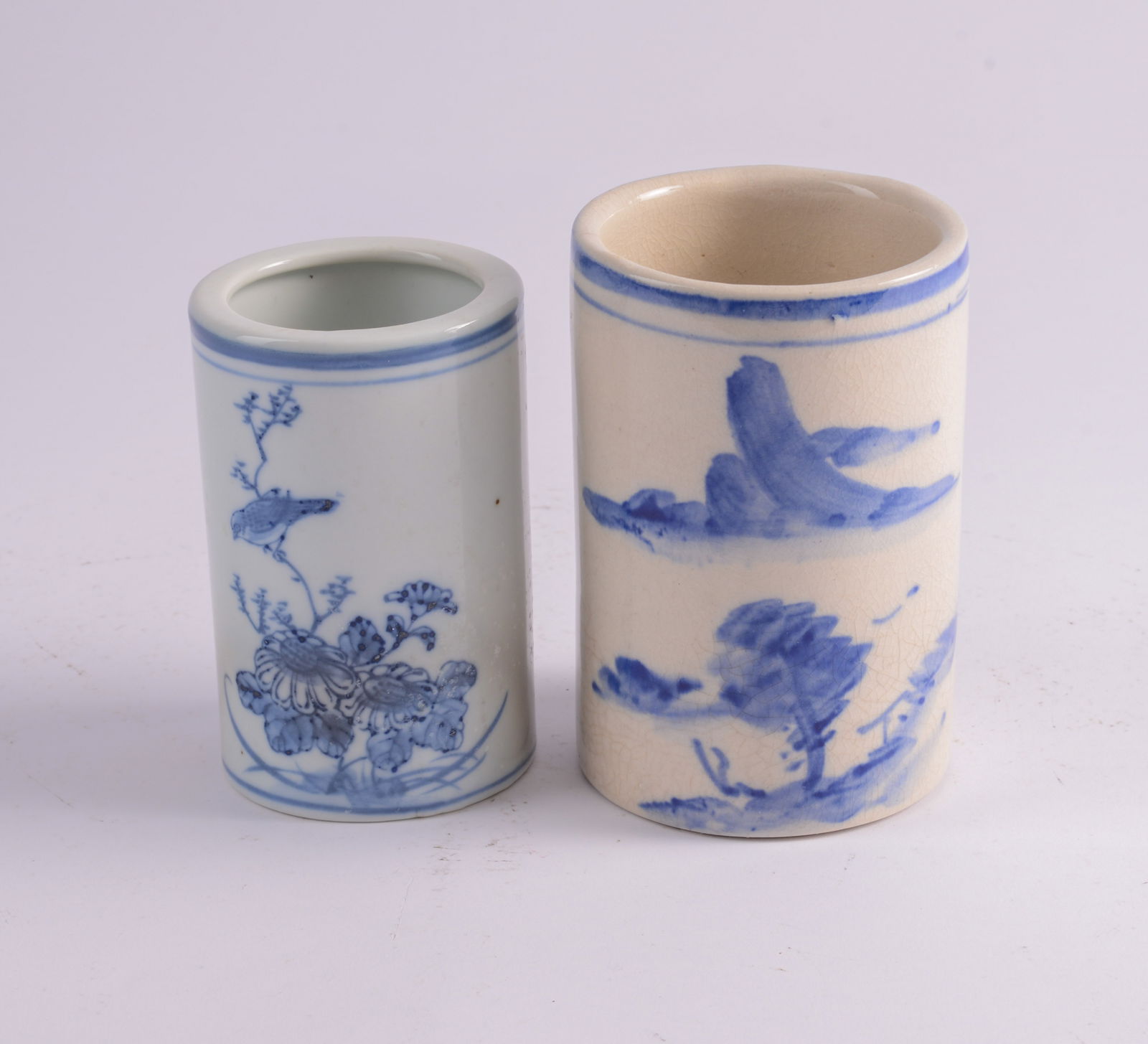 Two Chinese Blue and White Brush Pots.: Taller height 4.5 inches. Smaller with hair line crack.