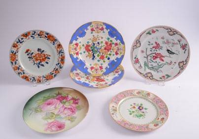 Five Porcelain Floral Decorated Plates.