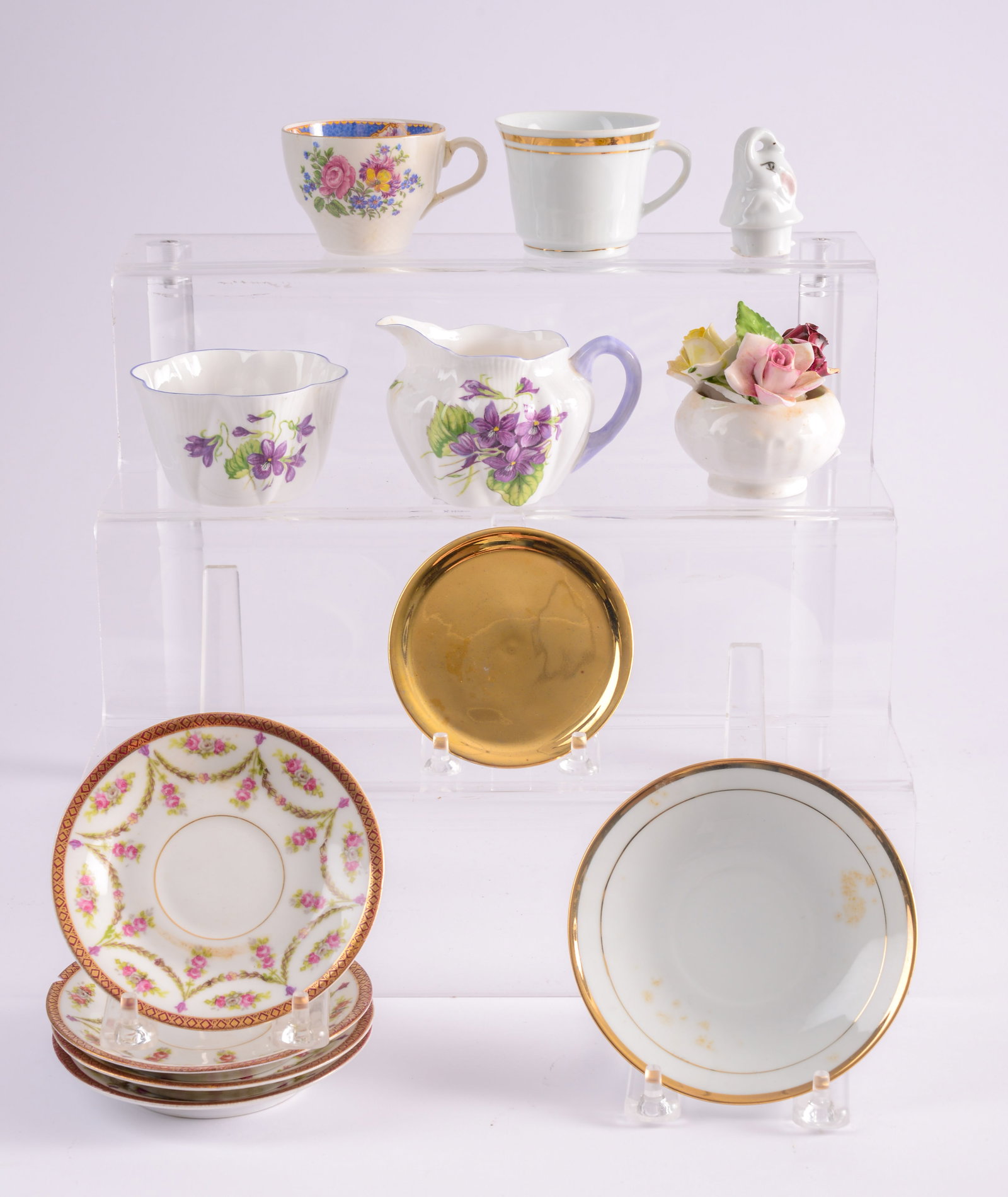 English Bone China Sugar and Creamer in Violet Pattern.: With Bone China table flowers and assorted cups and saucers. Height of creamer 2.75 inches. Chips to two plates.