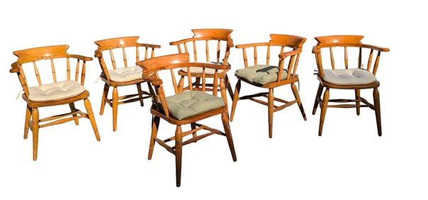 Six Captains Armchairs.