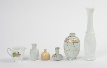 Group of four White and Gold Vases
