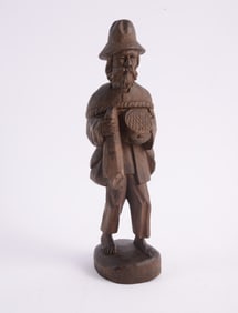 Carved Wooden Sculpture of a Fisherman.