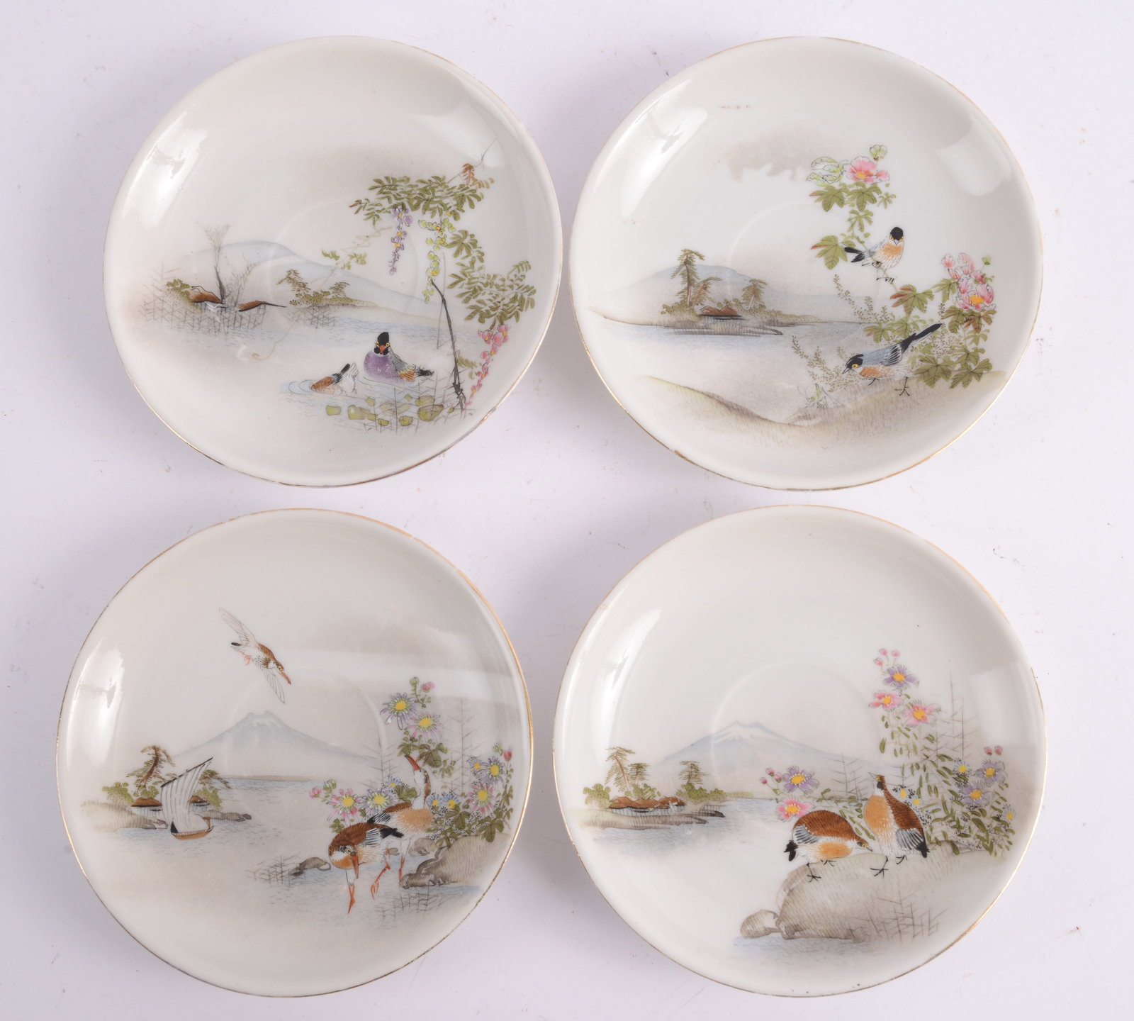 Four Asian Saucers.: Diameters 5.5 inches. Marked on back