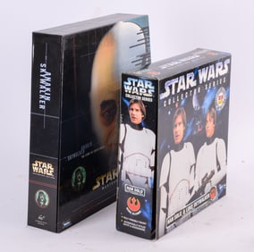 Three Star Wars Action Figures.
