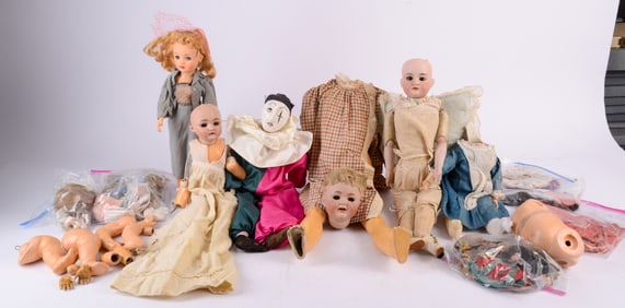 Group of DOlls and Doll Clothes.
