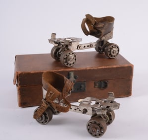 Pair of Vintage Strap On Roller Blades
