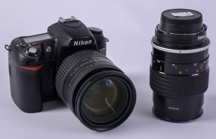 Nikon D80, 24-85mm Lens and 105mm Macro.