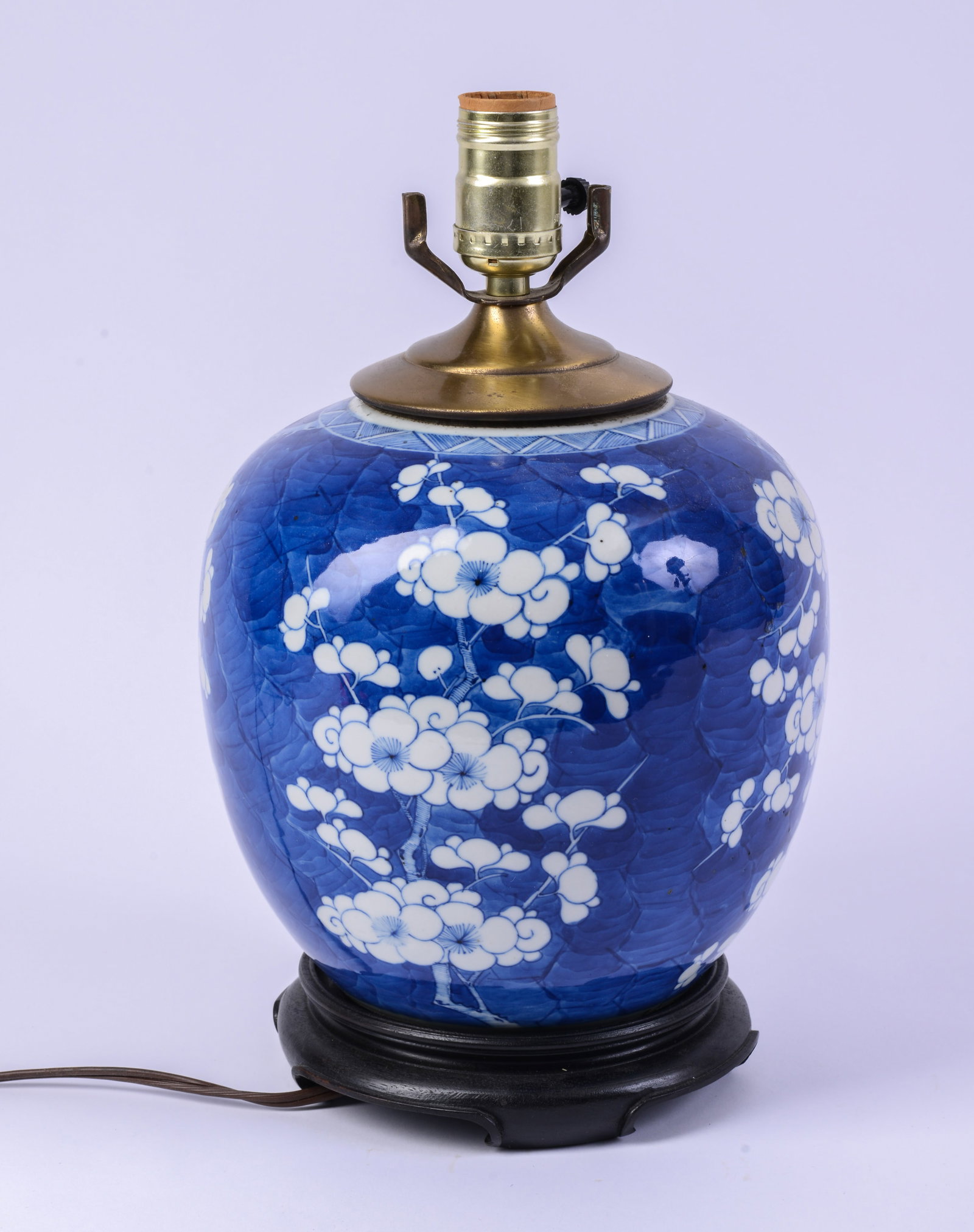 Chinese Blue and White Table Lamp With Prunus Design.: Height 14 inches. Good condition.