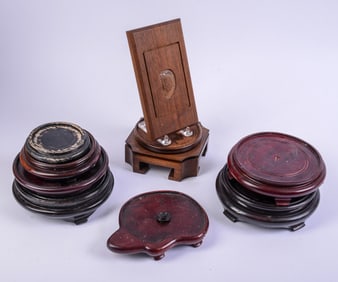 Eight Chinese Hardwood Stands.