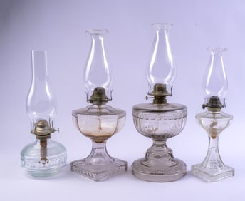 Four Glass Oil Lamps.