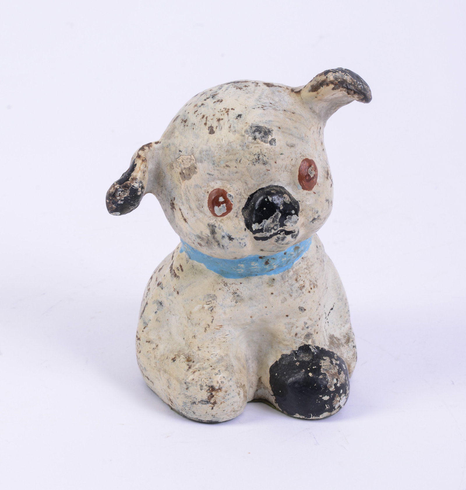 Hubley Mfg. Fido Cast Iron Doorstop.: Designed by Grace Drayton, 1914. Height 5 inches.
