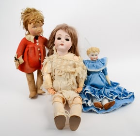 Three Antique Dolls.