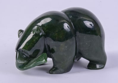 Carved Stone Bear With Salmon.