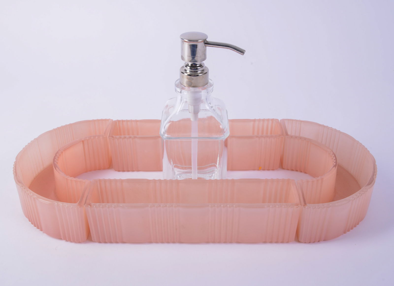 Four Piece Art Deco Pink Glass Centerpiece Serving Set.: Overall length 17 inches. Together with a clear glass soap dispenser.