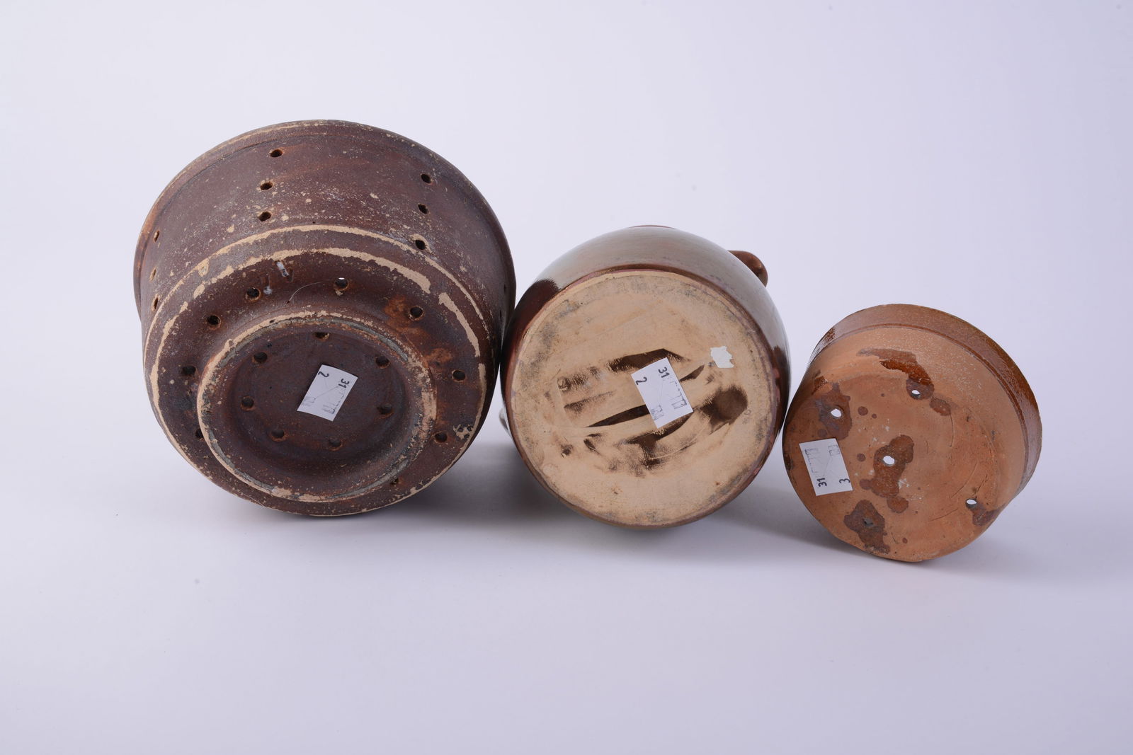 Small Redware Pitcher and Two Collanders. - 11