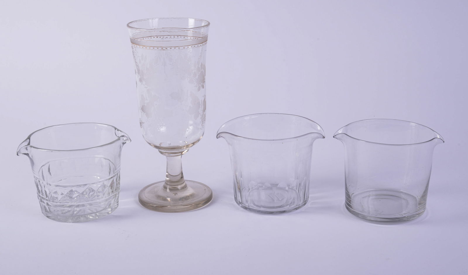 Three Glass Beakers and a Celery Vase.: Height of vase 9 inches.