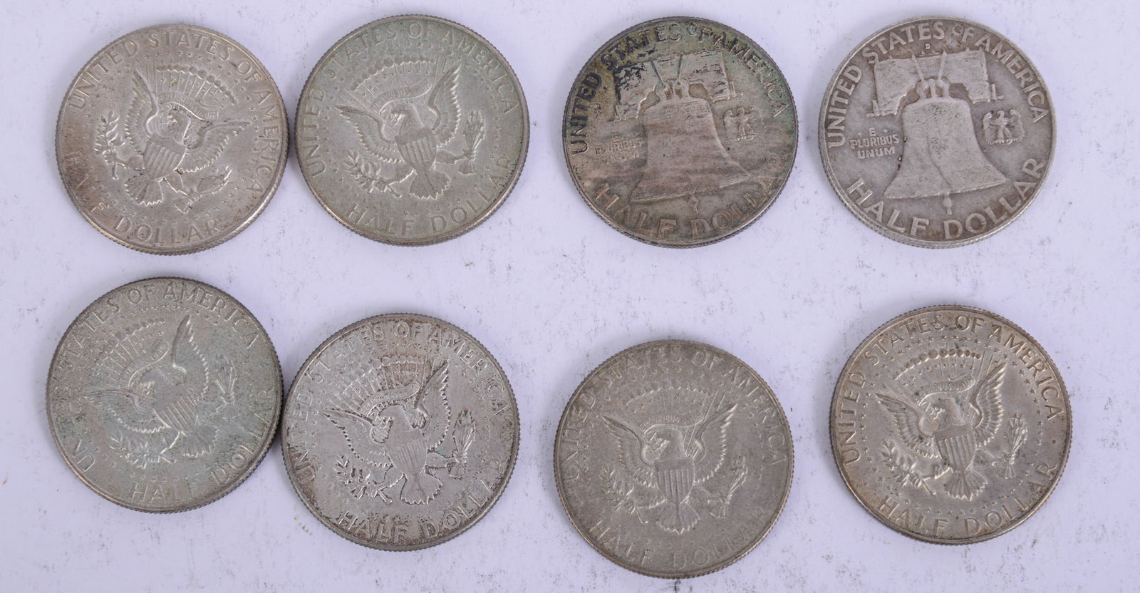 Nine Silver Half Dollars. - 2