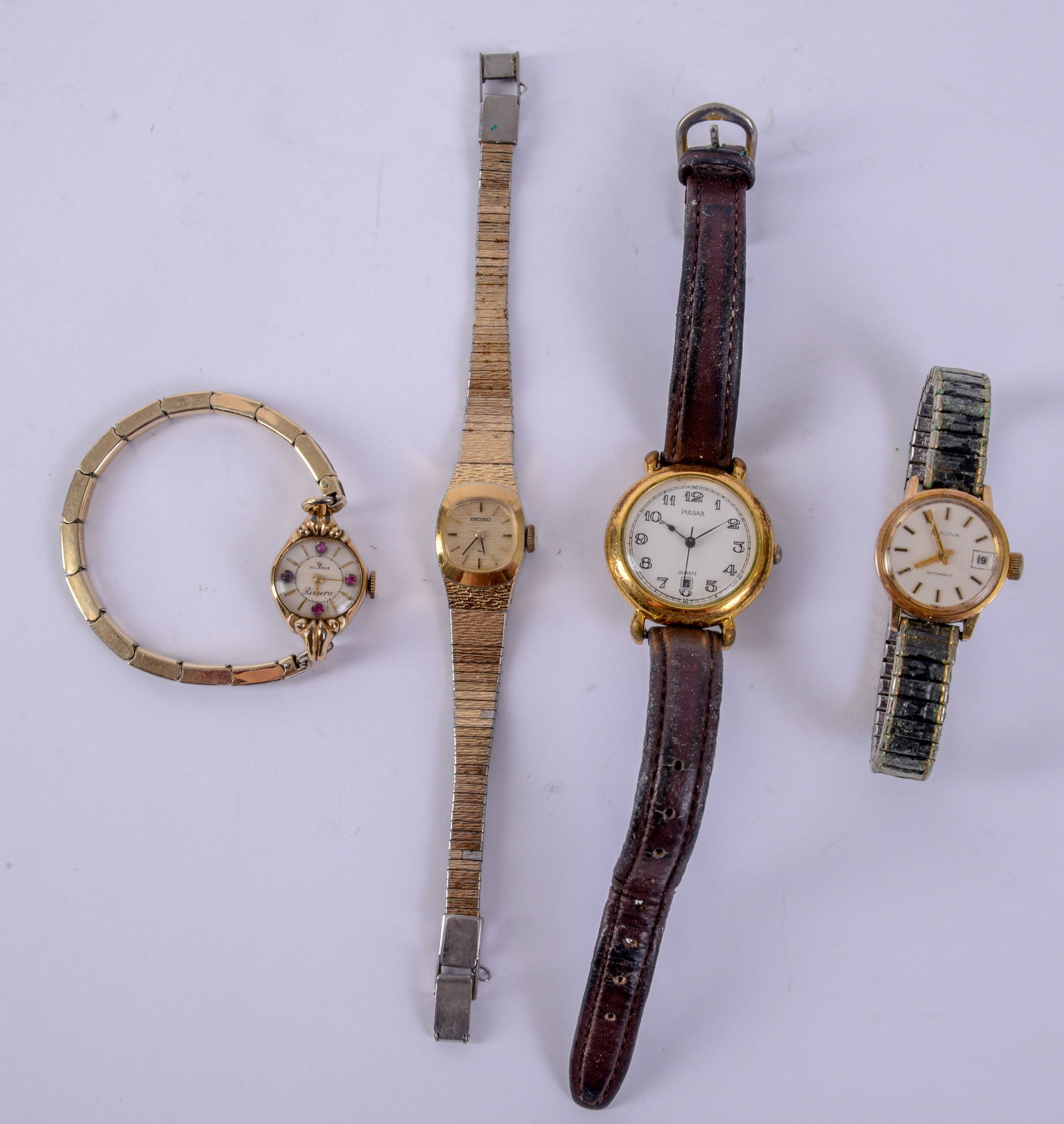Four Ladies Watches.: Riviera-Helbros, Seiko, Bulova and Pulsar. Diameter of largest 1 inch, not tested for operation.