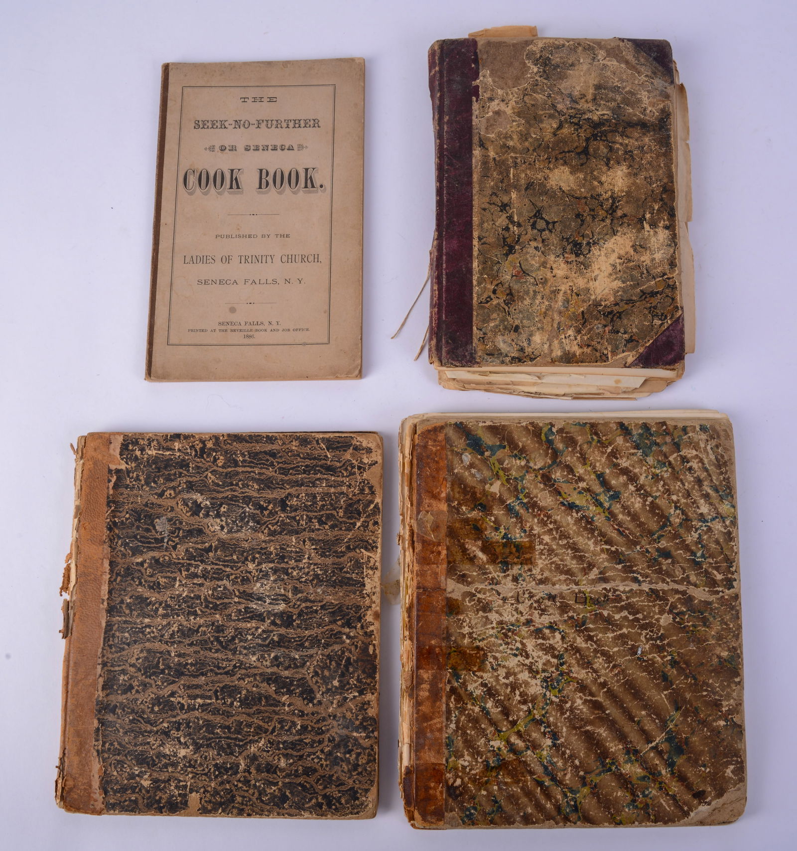 Four Antique Cookbooks.: Seneca Falls, 1886, and three handwritten. One includes journal of daily conditions.