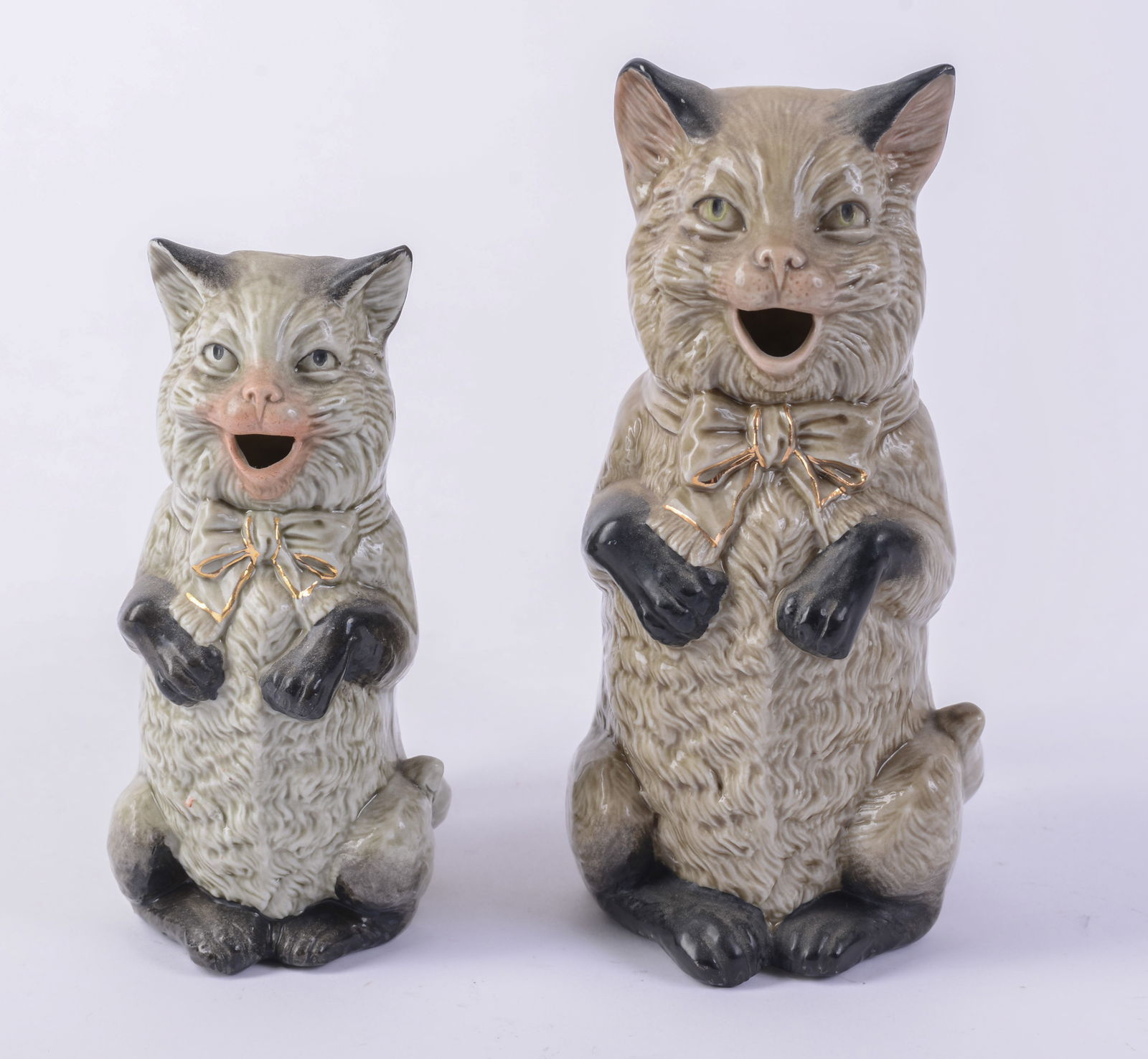Two Seated Cat Pitchers. (1 of 4)