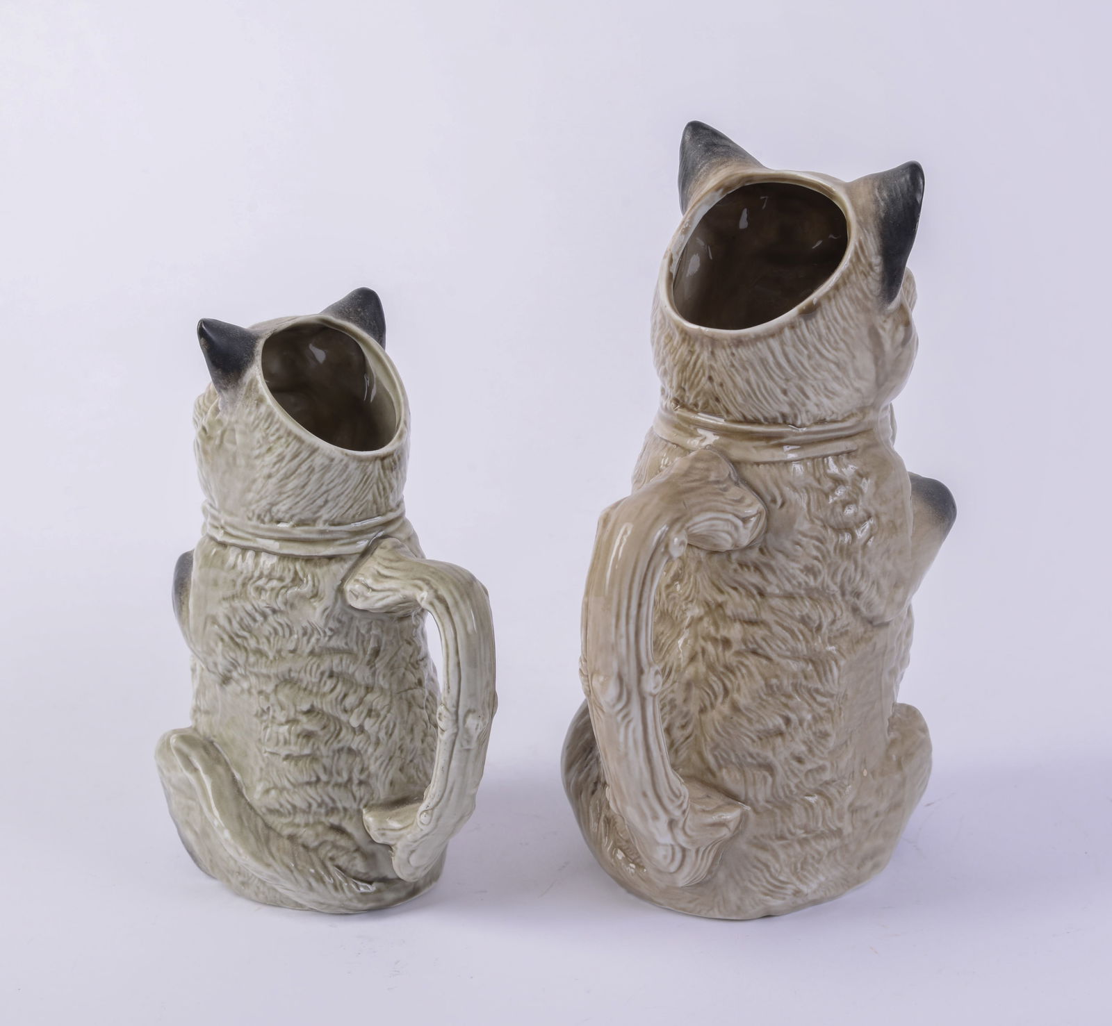 Two Seated Cat Pitchers. - 3