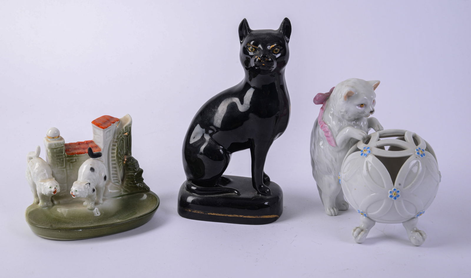 Three Porcelain Cat Figures. (1 of 3)