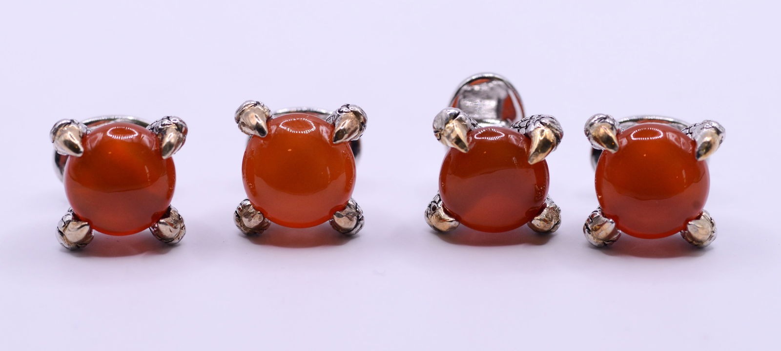 Jan Leslie Sterling Silver and Amber Shirt Stud Set.: Claw design, diameter .5 inches, new in bag.