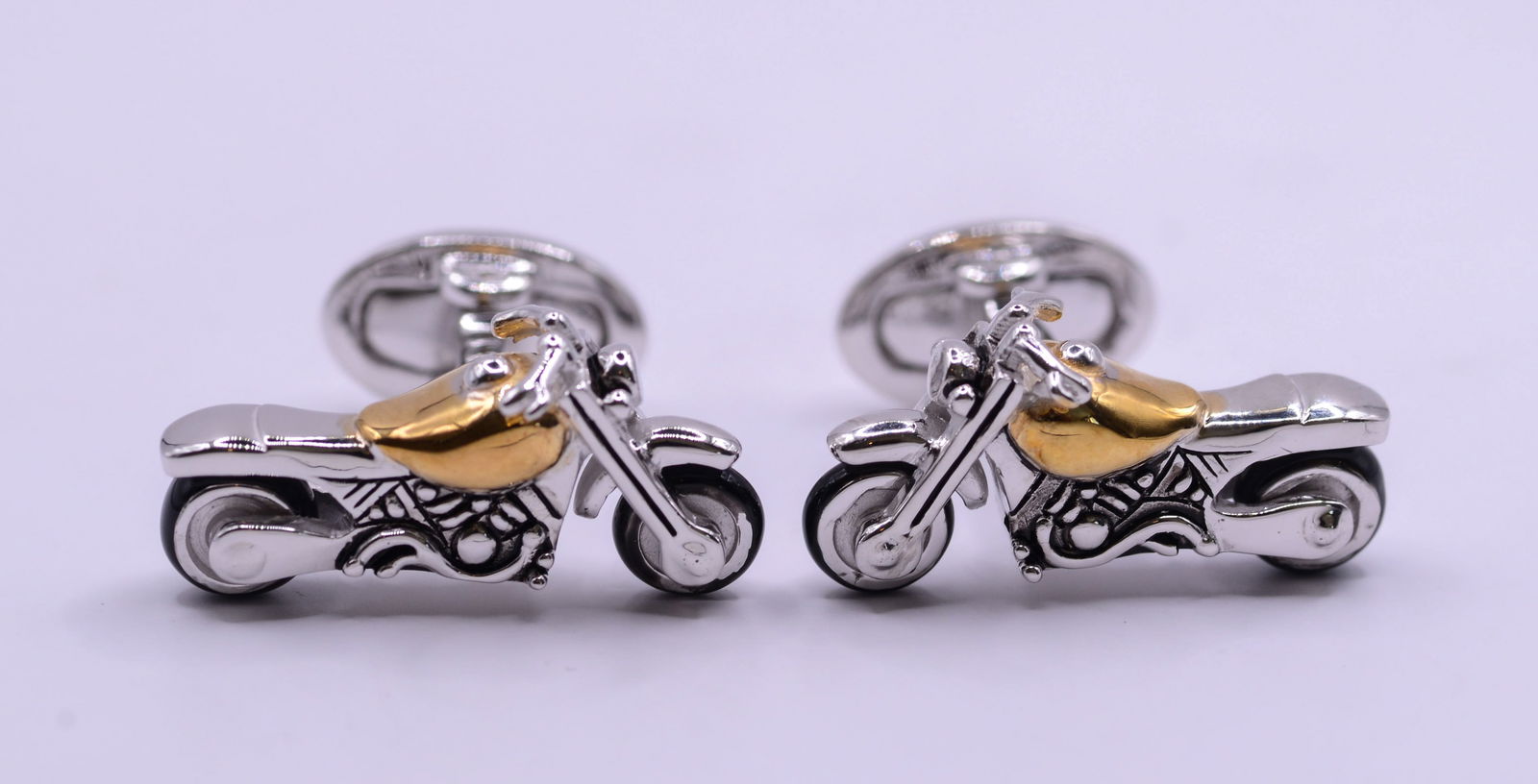 Pair of Jan Leslie Sterling Silver Motorcycle Cufflinks.: Length 2 inches, new in bag.