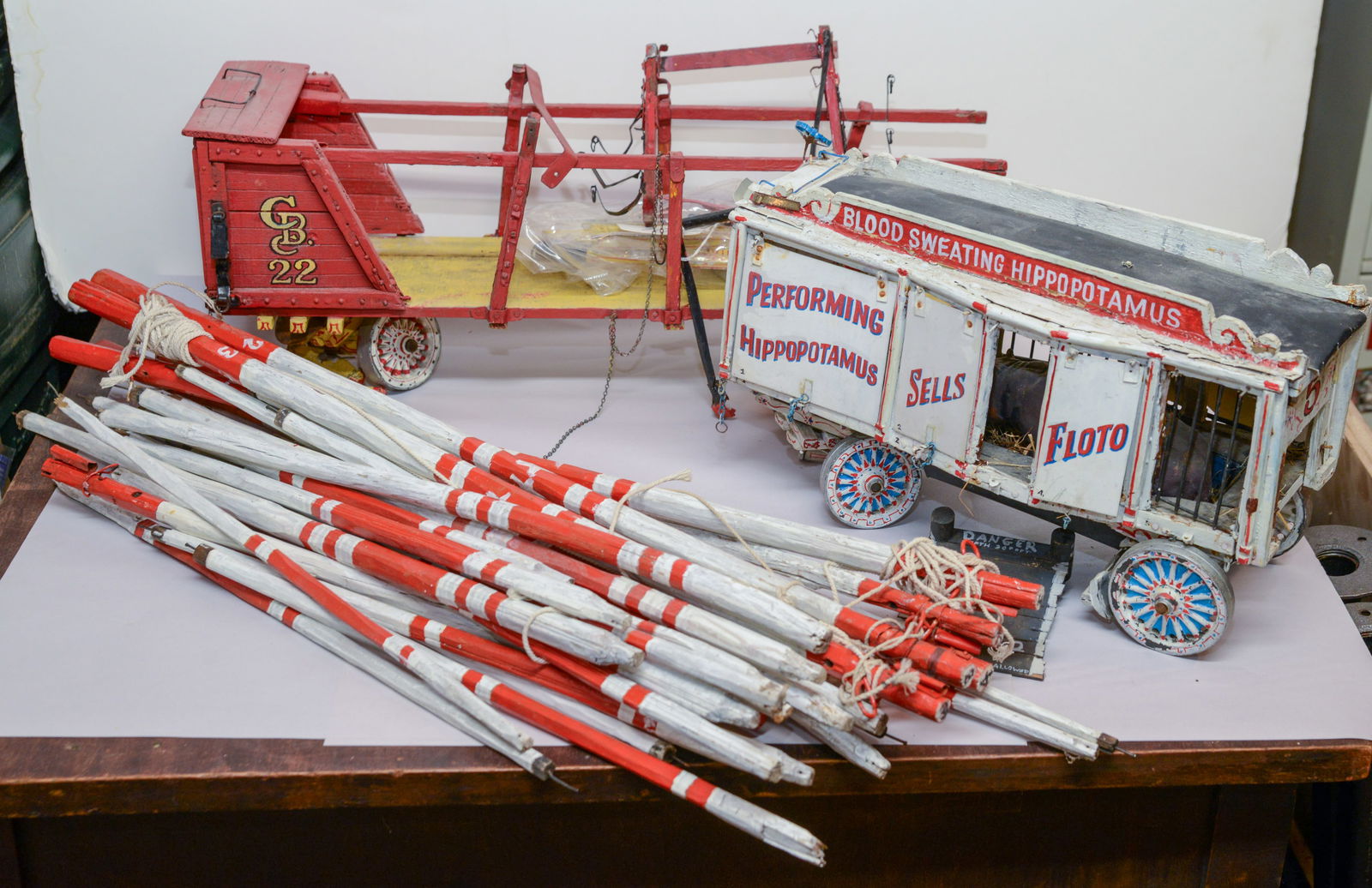 Two Folk Art Circus Trains.: Length of longest 24 inches. Some repairs needed.