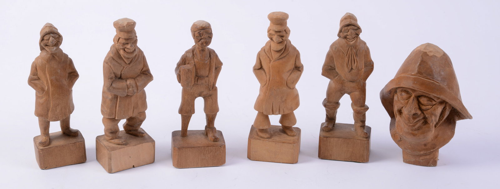 Armand La Montagne (1938-2025). Six Carved Wooden Figures.: Heights 5 to 6.5 inches.