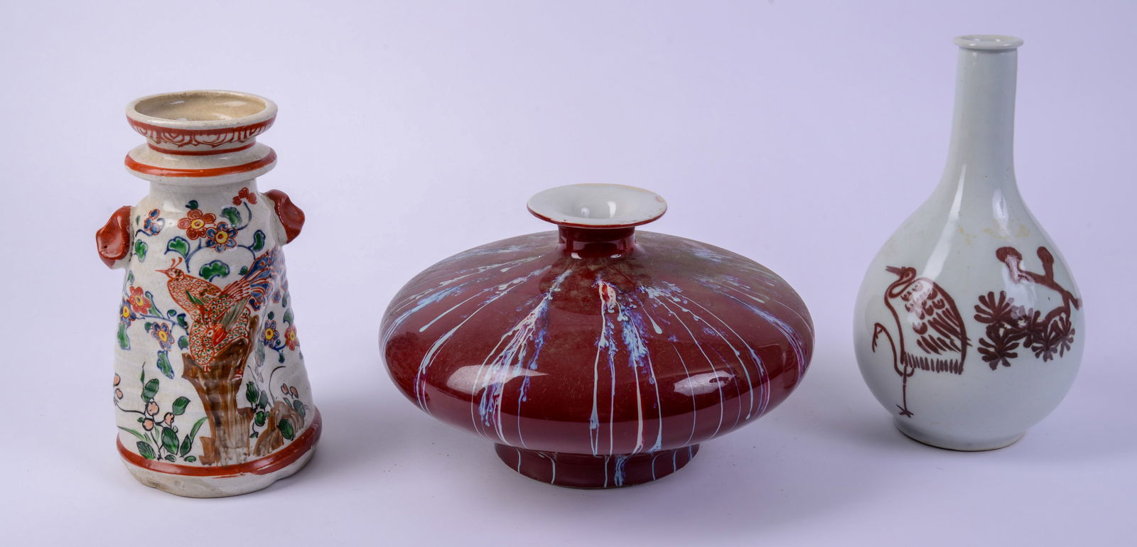Contemporary Red Glazed Vessel with Two Chinese Vases.: Vessel height 7 inches. Good condition.