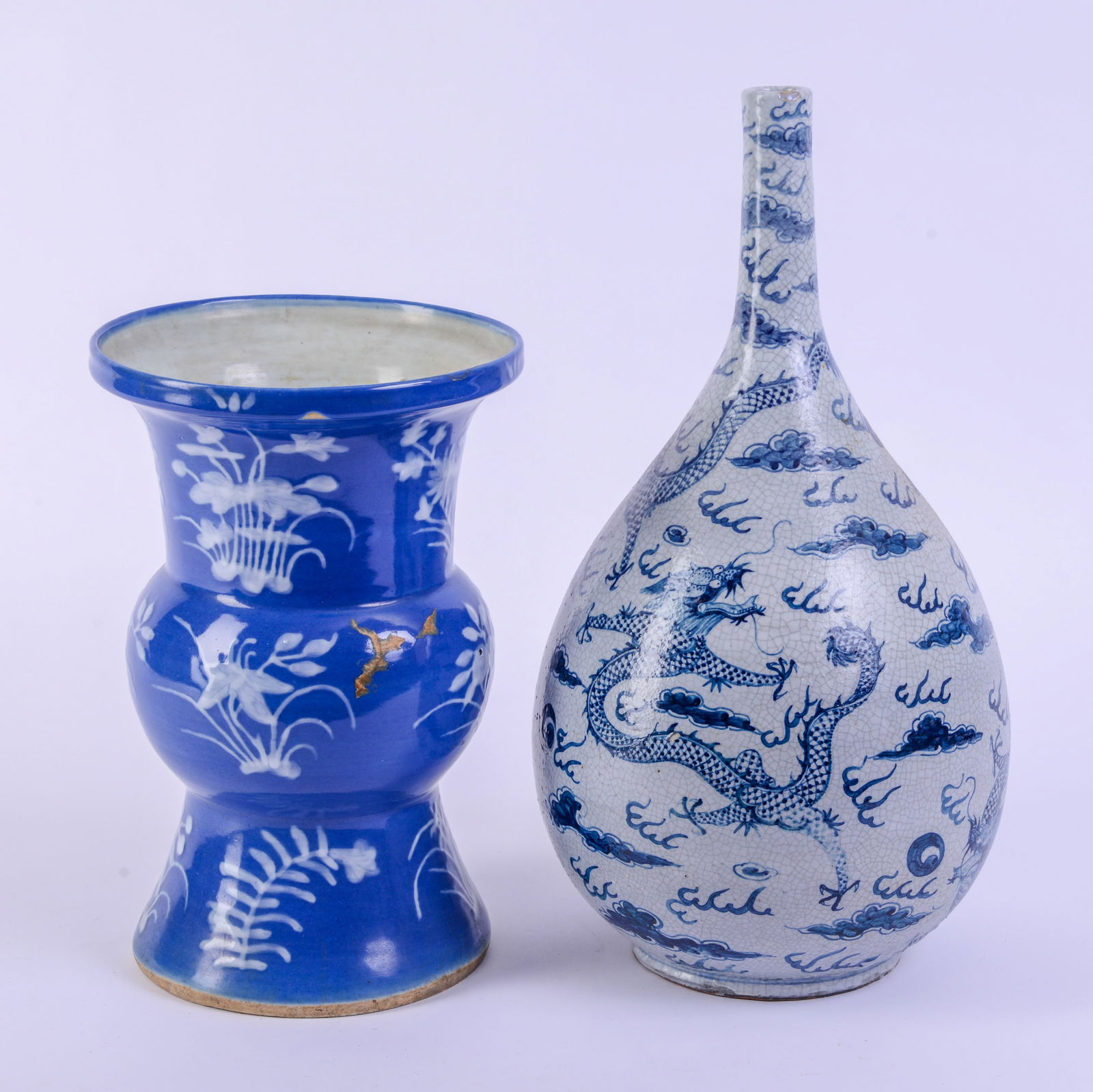 Two Large Chinese Blue and White Vases.: With slip painting and craquelure. Tallest vase height 18.5 inches. Good condition.